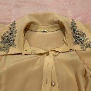 Silk crème blouse by Ukrainian designer Olena Dats shoulder open sleeves size 6.